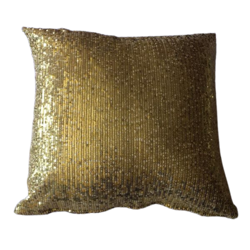 coussin à paillettes dorées